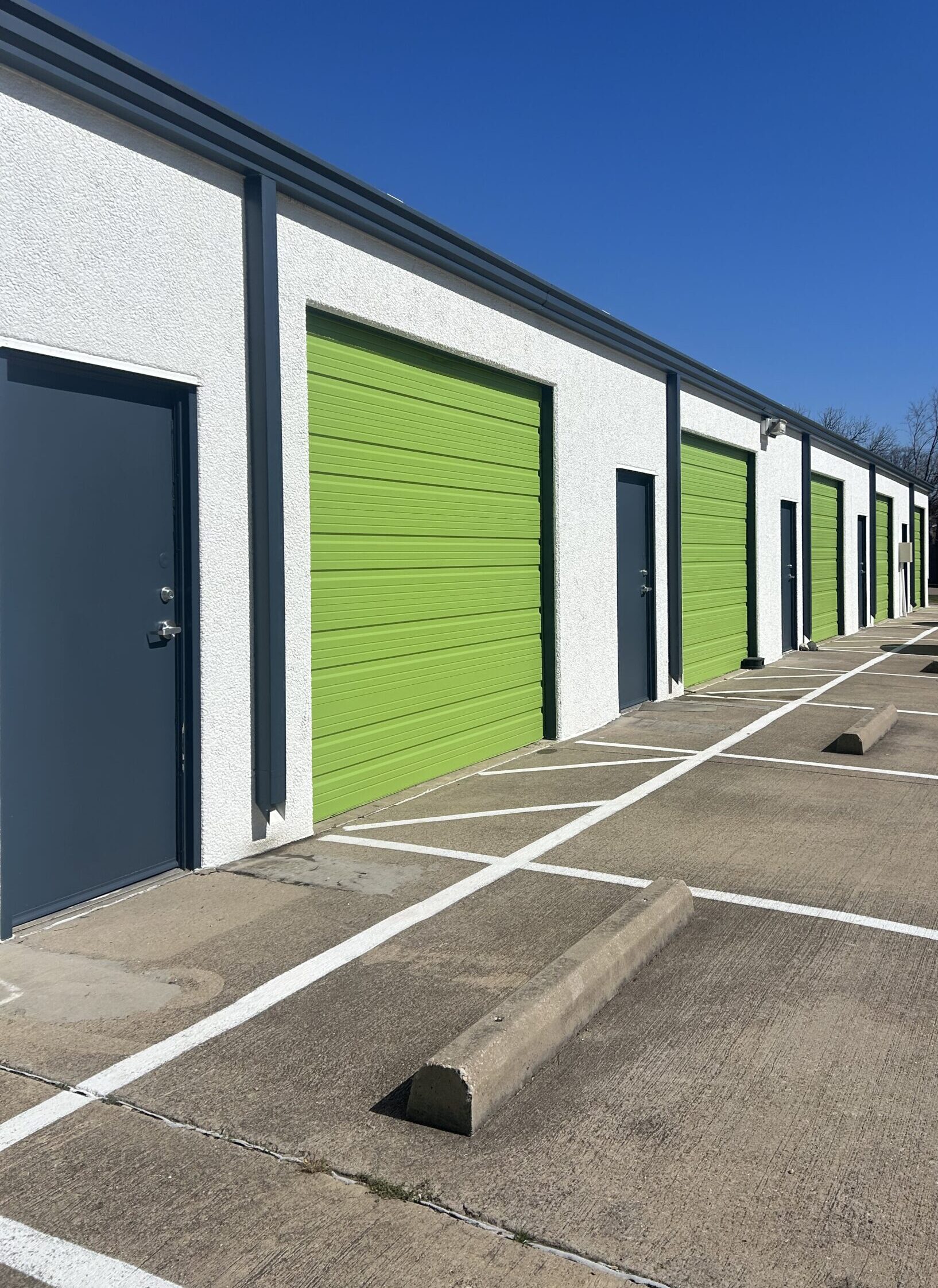Exterior of a WorkBay park with signage and parking