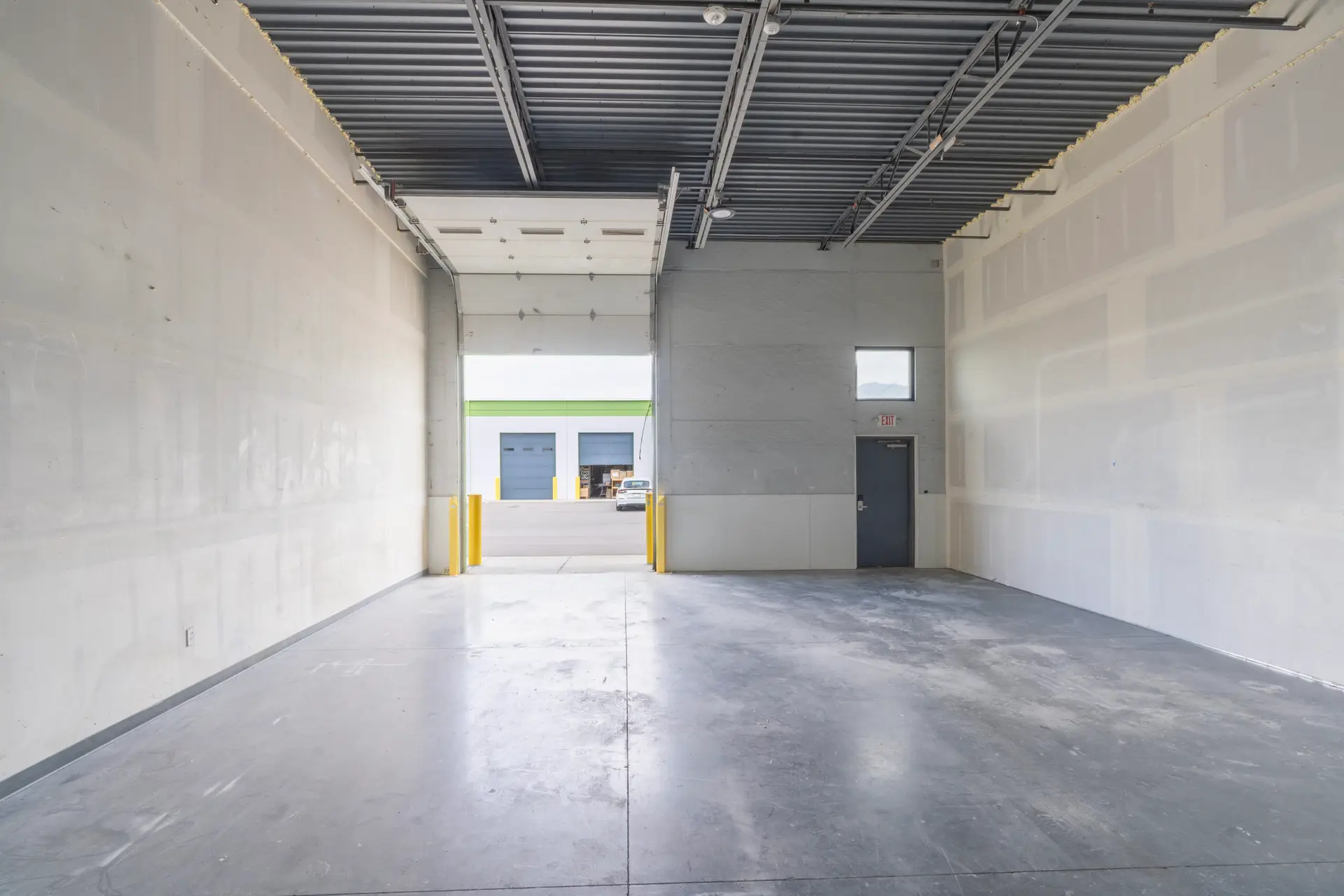 WorkBay unit with an open roll up door