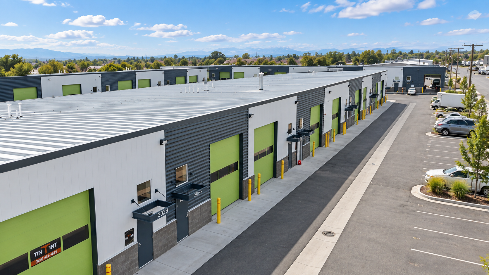 WorkBay units with green roll up doors